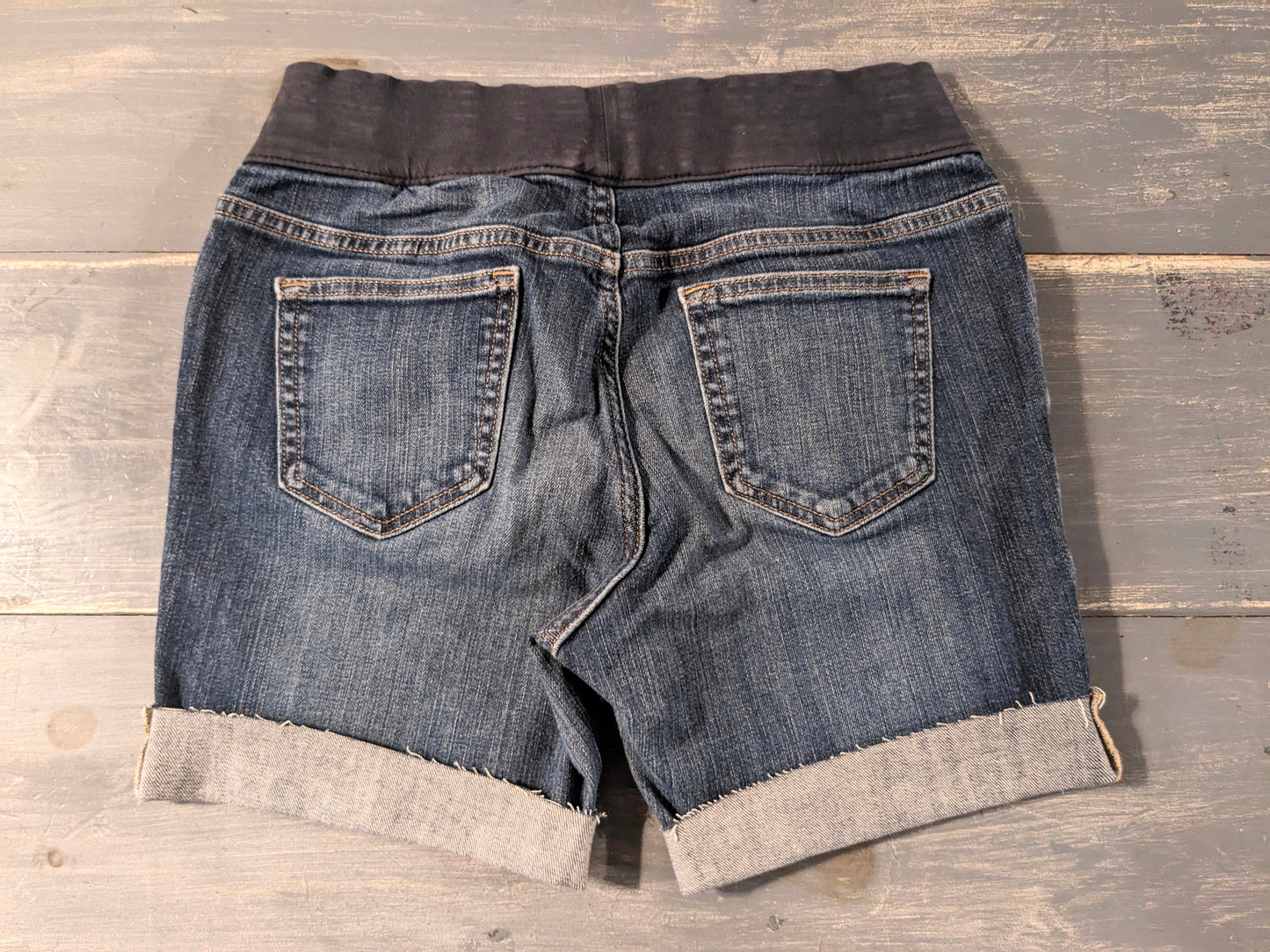 Hand-embroidered under-belly panel 4.5" cuffed hem denim shorts, Medium wash