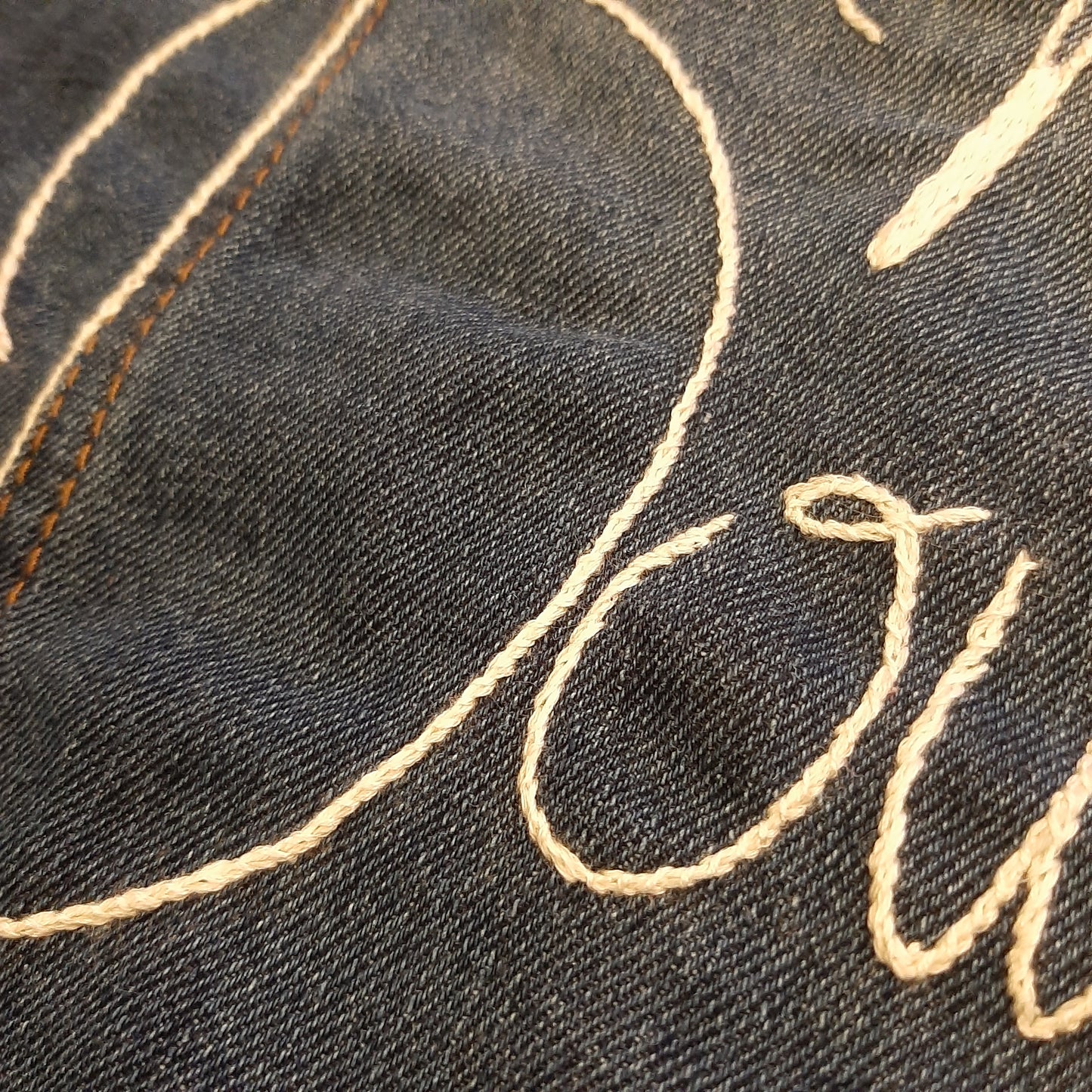 Custom hand-embroidered graphic